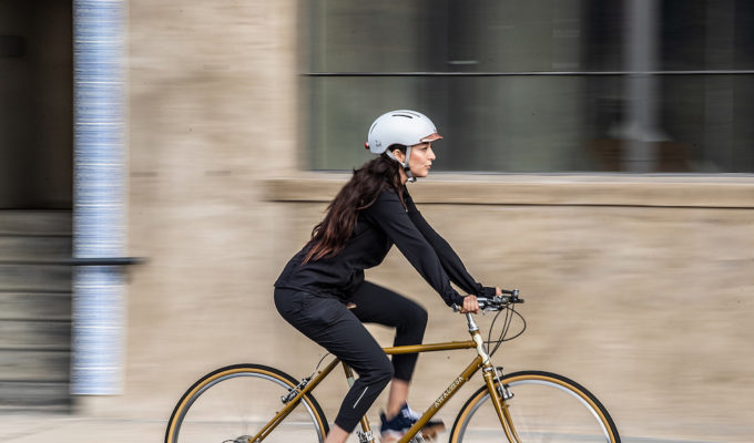 Woman riding bike in city